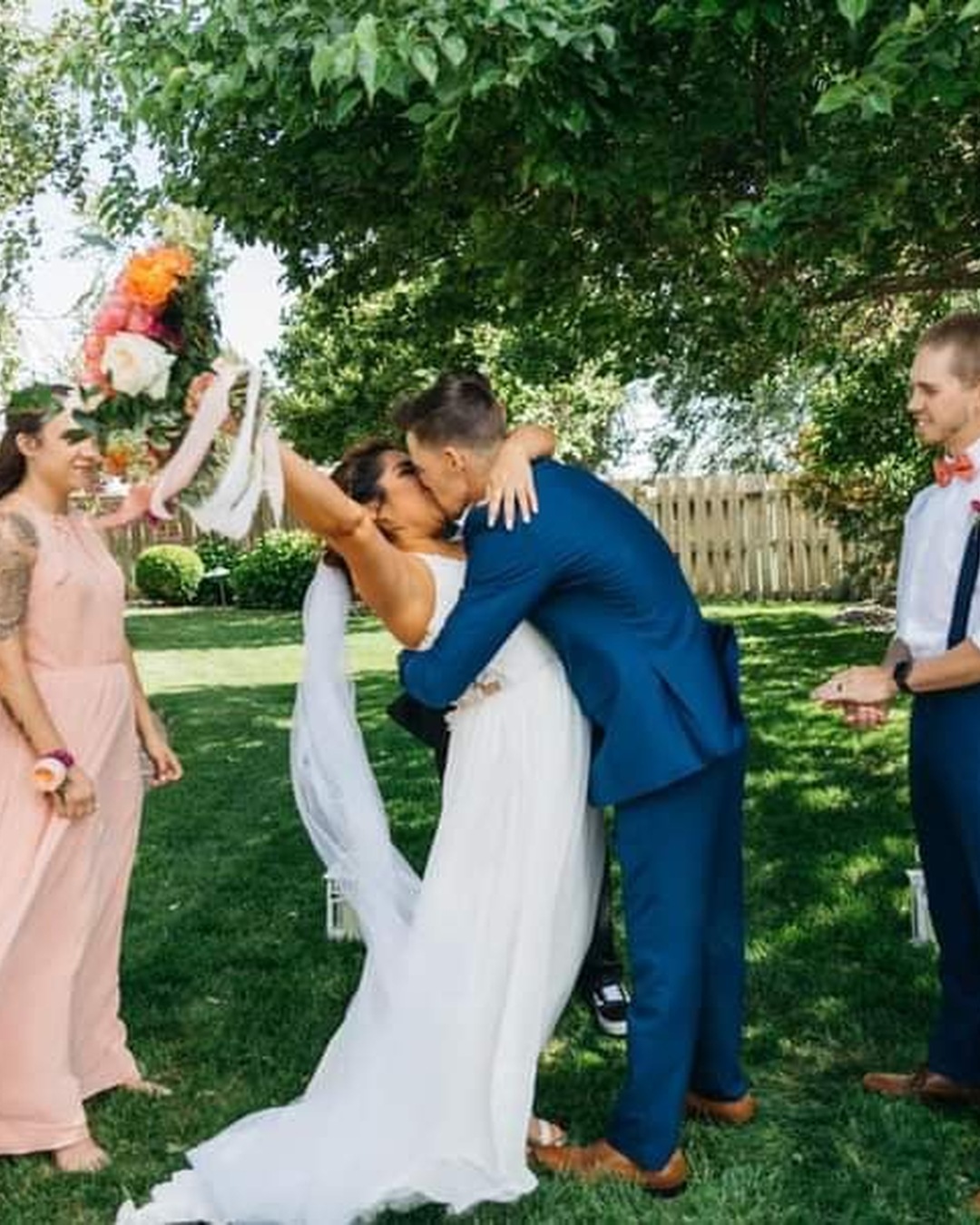 Real wedding at Stone Ridge Estates featured in How to Build a Wedding-Day Cheer Section That Supports Both Partners