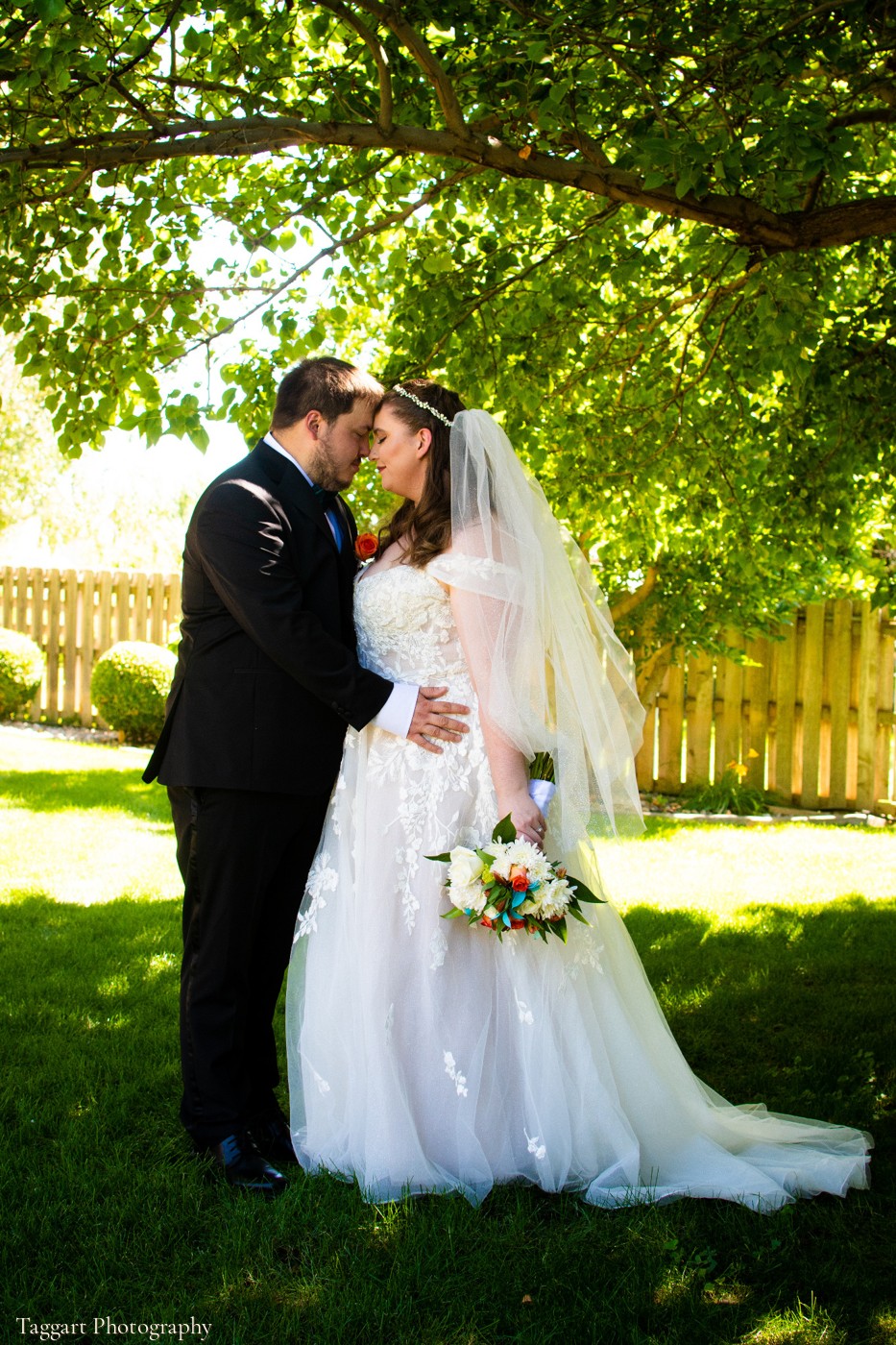Real wedding at Stone Ridge Estates featured in The Hugs in a Stone Ridge Wedding Album