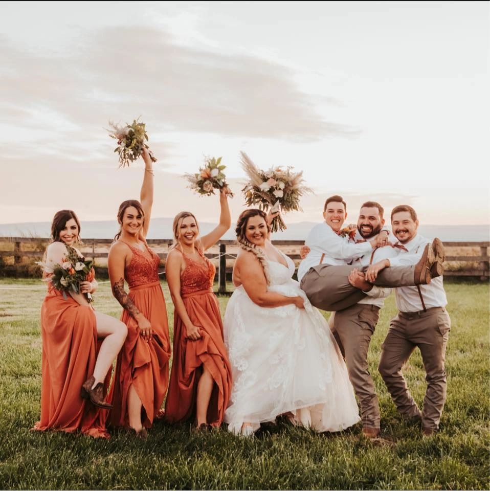 boho rustic wedding bouquets just married couple in pasture at stone ridge estaes wedding venue
